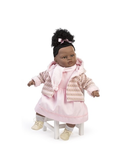 Sweet mulatto crying baby with pink dress and scarf in box