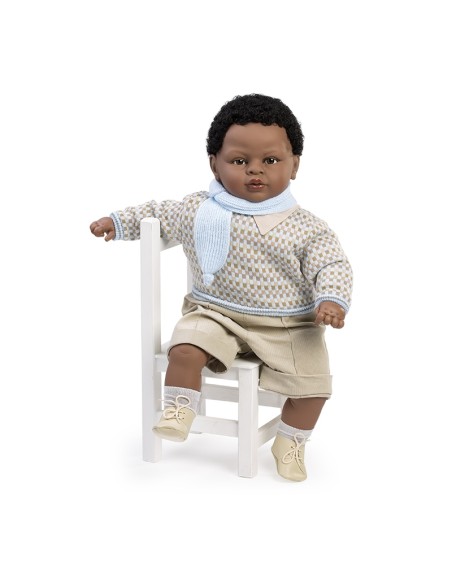 Crying mulatto sweet baby with suit and blue scarf in bag