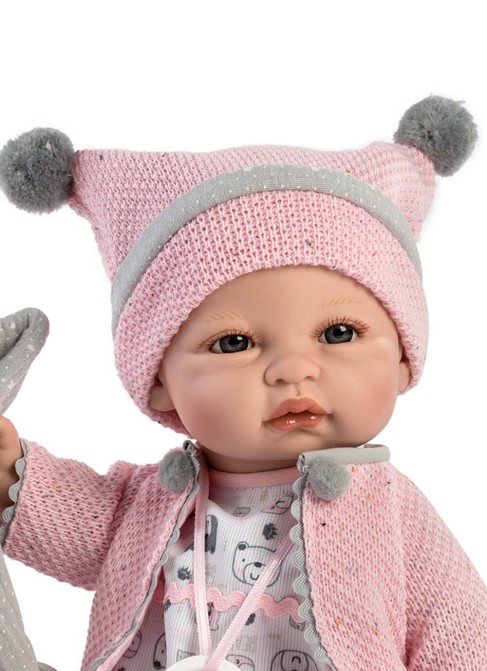 Veste bébé rose corail en boîte 34cm