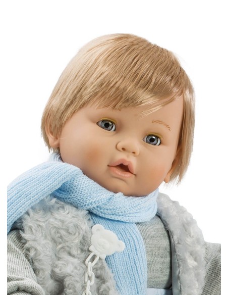 Crying Sweet Baby avec gilet gris dans un sac